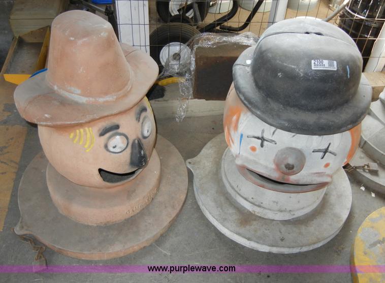 image for item 2100 (4) assorted cast iron trash can lids