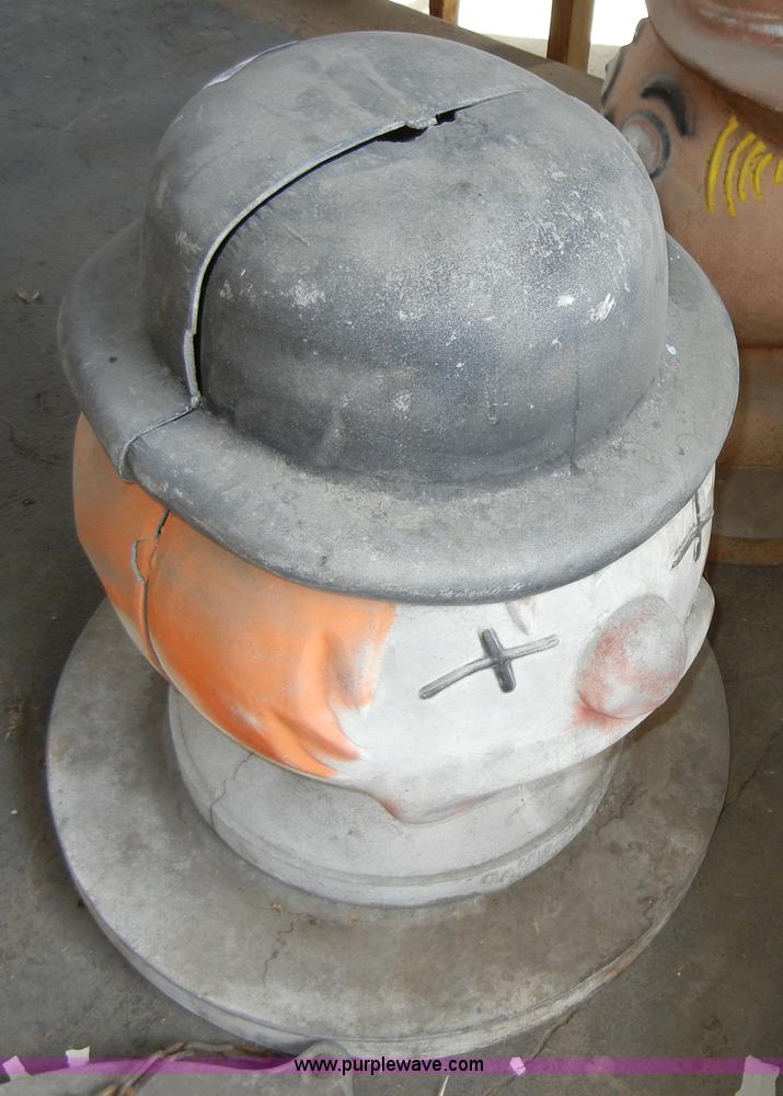 image for item 2100 (4) assorted cast iron trash can lids