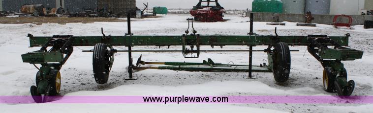 image for item 4648 John Deere 7100 two row planter on wide bar