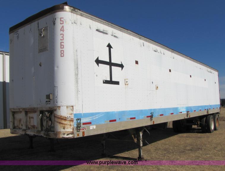 image for item 3567 1981 Fruehauf open top van trailer with tarp