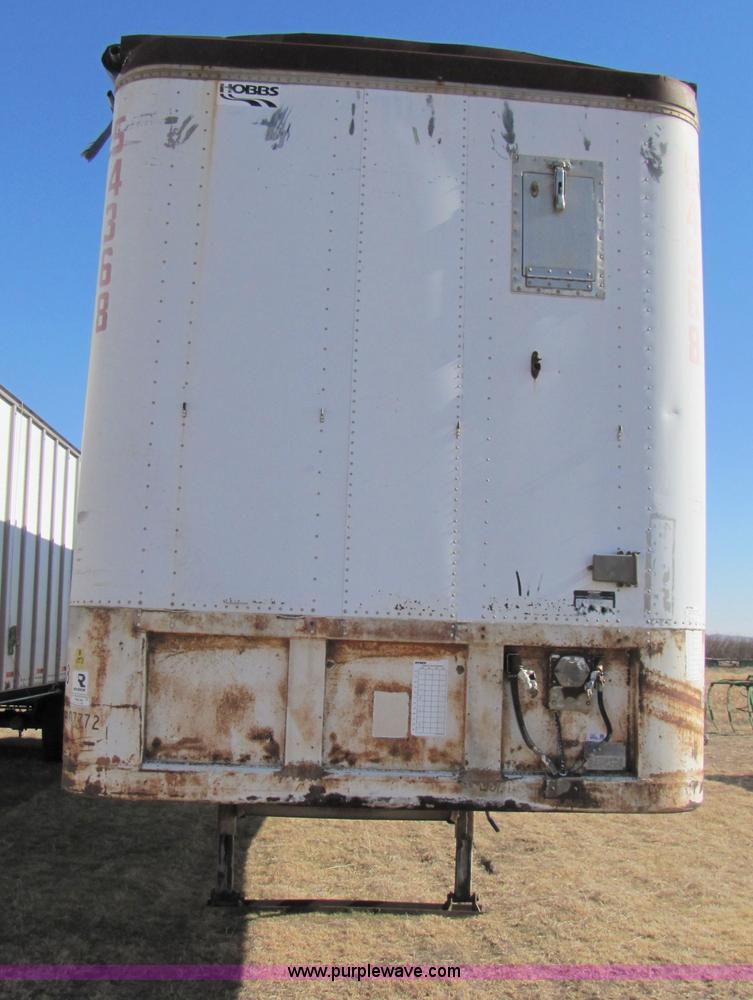 image for item 3567 1981 Fruehauf open top van trailer with tarp