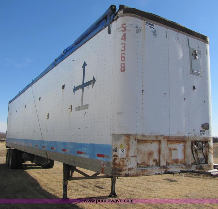 image for item 3567 1981 Fruehauf open top van trailer with tarp