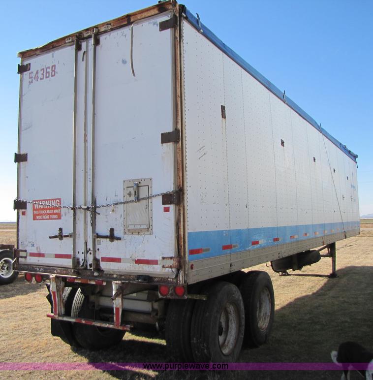 image for item 3567 1981 Fruehauf open top van trailer with tarp