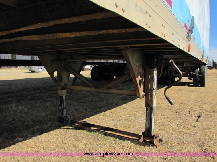 image for item 3567 1981 Fruehauf open top van trailer with tarp