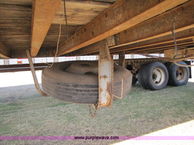 image for item 3567 1981 Fruehauf open top van trailer with tarp