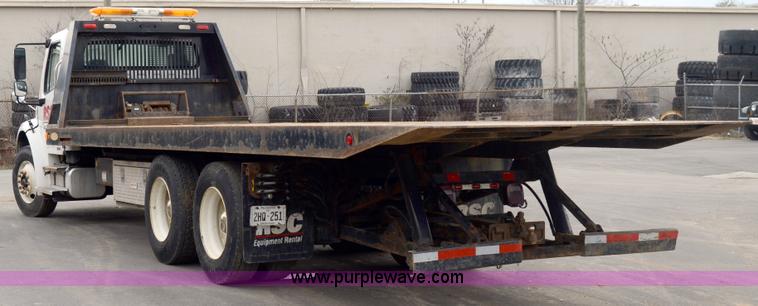 image for item 6041 2006 Freightliner M2 106 medium duty rollback truck