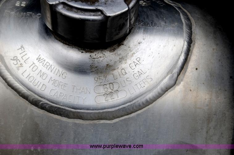 image for item 6041 2006 Freightliner M2 106 medium duty rollback truck