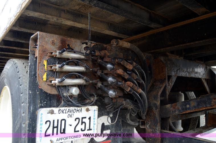 image for item 6041 2006 Freightliner M2 106 medium duty rollback truck