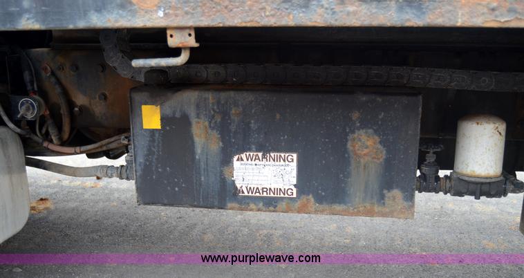 image for item 6041 2006 Freightliner M2 106 medium duty rollback truck