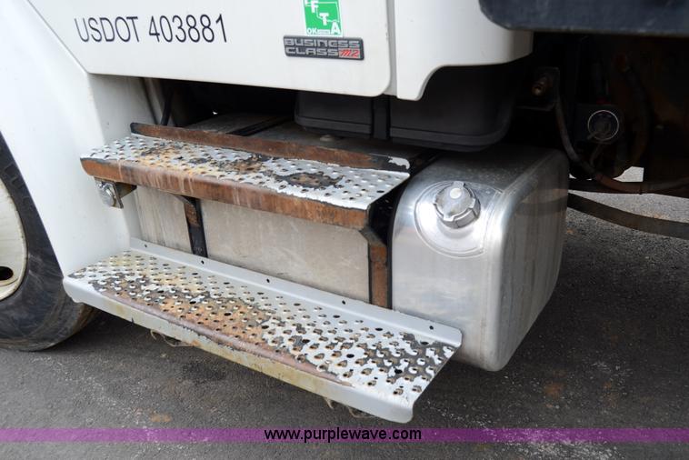 image for item 6041 2006 Freightliner M2 106 medium duty rollback truck