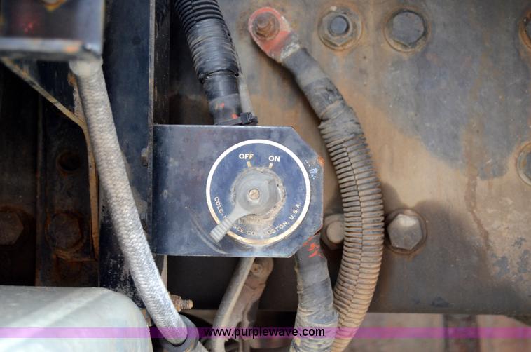 image for item 6041 2006 Freightliner M2 106 medium duty rollback truck