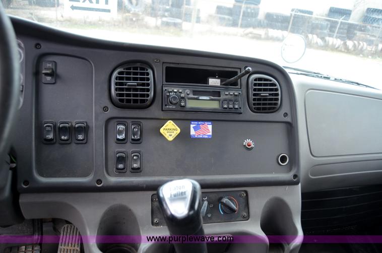 image for item 6041 2006 Freightliner M2 106 medium duty rollback truck