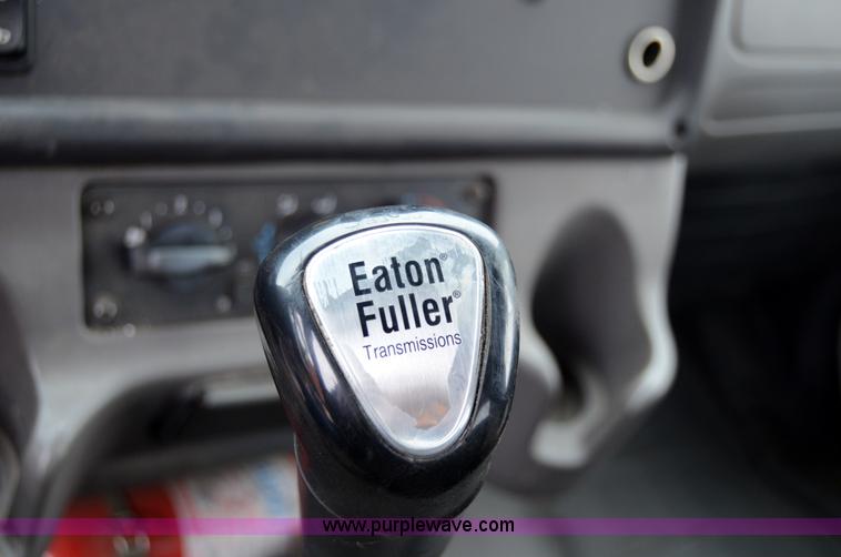 image for item 6041 2006 Freightliner M2 106 medium duty rollback truck