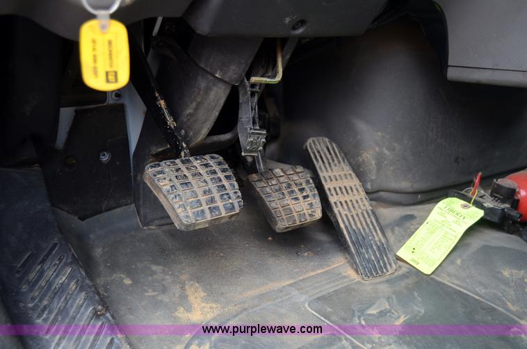 image for item 6041 2006 Freightliner M2 106 medium duty rollback truck