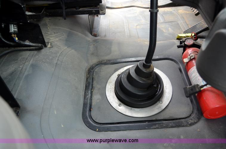 image for item 6041 2006 Freightliner M2 106 medium duty rollback truck