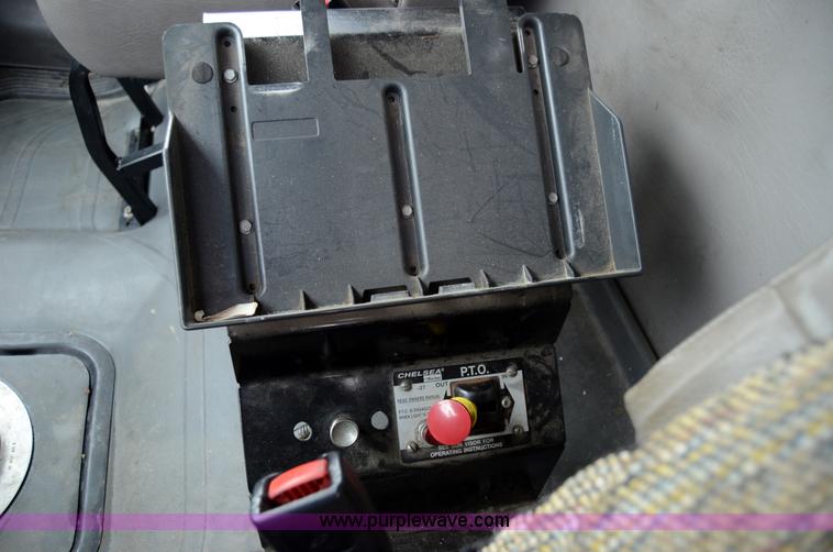 image for item 6041 2006 Freightliner M2 106 medium duty rollback truck