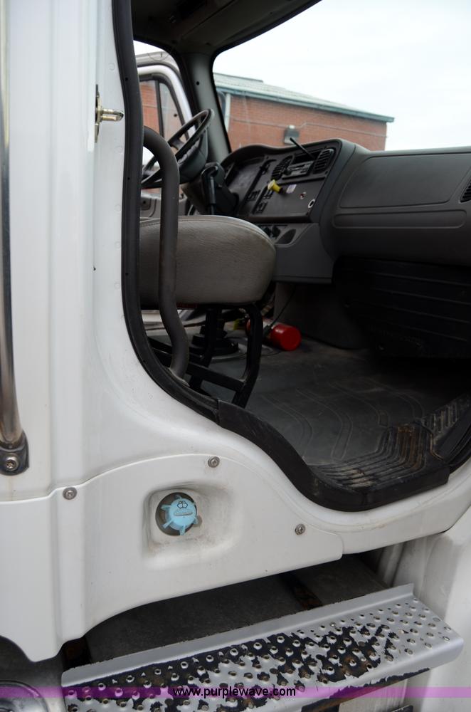 image for item 6041 2006 Freightliner M2 106 medium duty rollback truck