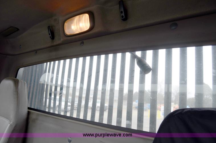 image for item 6041 2006 Freightliner M2 106 medium duty rollback truck