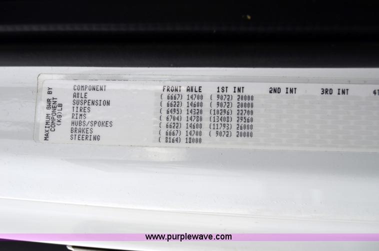 image for item 6041 2006 Freightliner M2 106 medium duty rollback truck