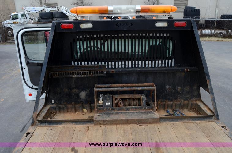 image for item 6041 2006 Freightliner M2 106 medium duty rollback truck