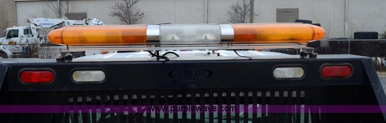 image for item 6041 2006 Freightliner M2 106 medium duty rollback truck