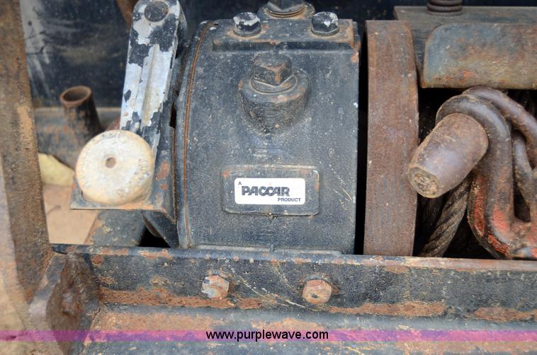 image for item 6041 2006 Freightliner M2 106 medium duty rollback truck