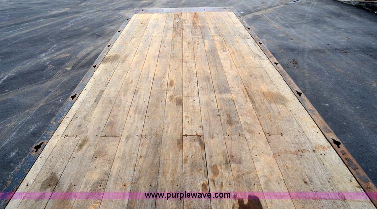 image for item 6041 2006 Freightliner M2 106 medium duty rollback truck