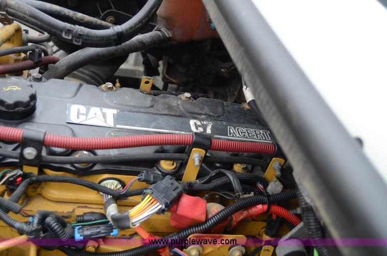 image for item 6041 2006 Freightliner M2 106 medium duty rollback truck