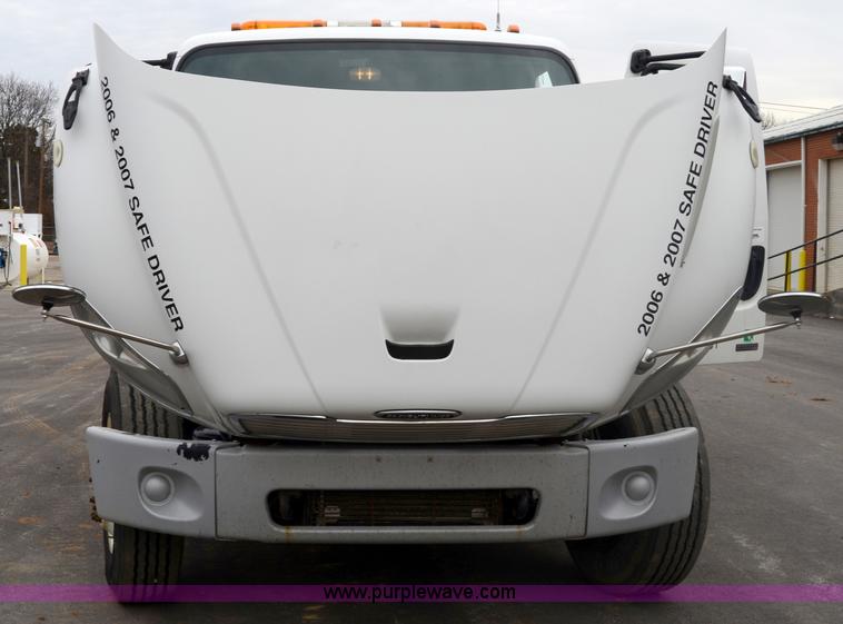 image for item 6041 2006 Freightliner M2 106 medium duty rollback truck