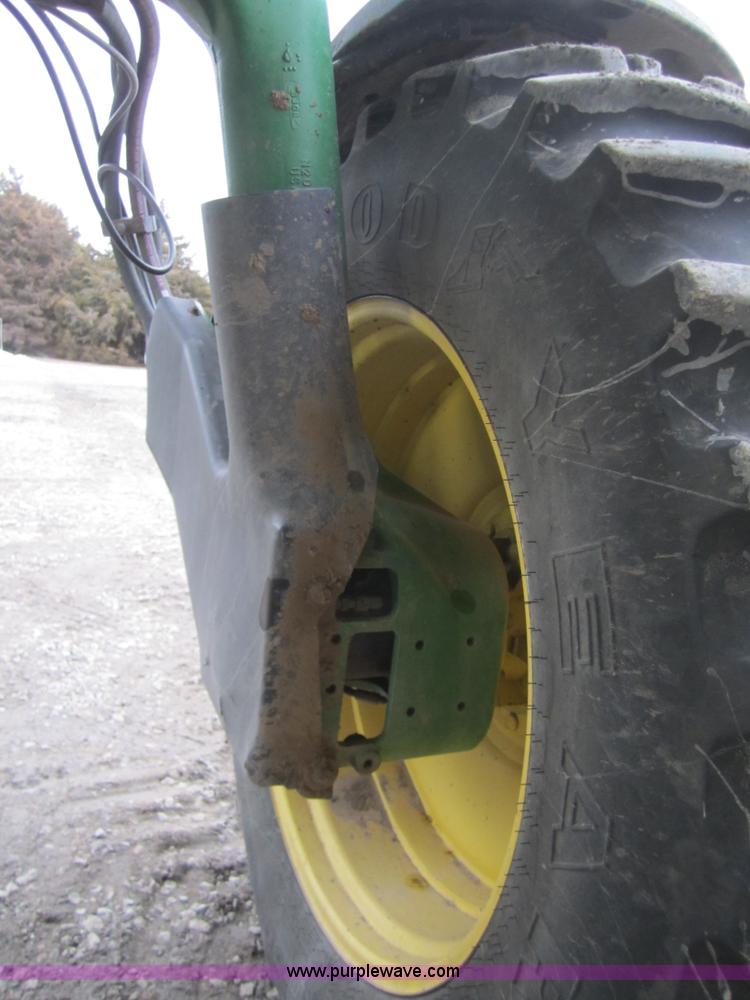 image for item 1600 1999 John Deere 4700 self-propelled sprayer