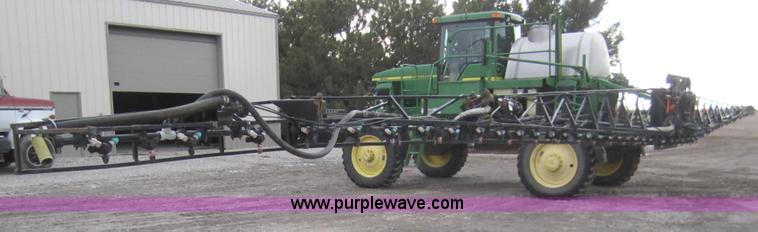 image for item 1600 1999 John Deere 4700 self-propelled sprayer