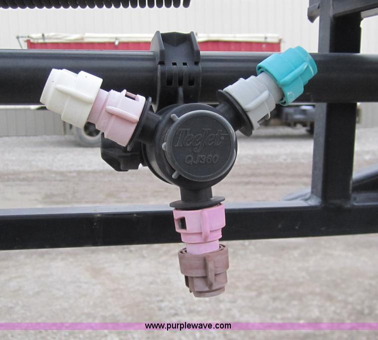 image for item 1600 1999 John Deere 4700 self-propelled sprayer