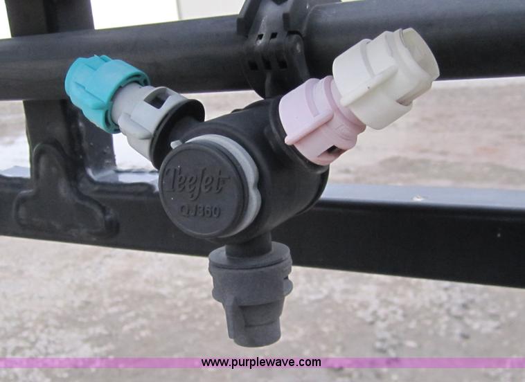 image for item 1600 1999 John Deere 4700 self-propelled sprayer