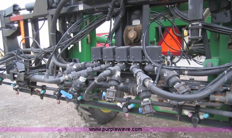 image for item 1600 1999 John Deere 4700 self-propelled sprayer