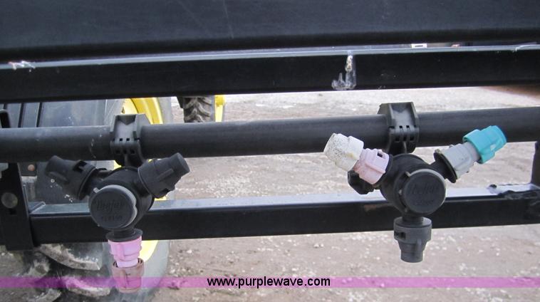 image for item 1600 1999 John Deere 4700 self-propelled sprayer