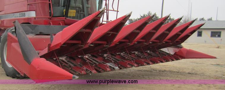 image for item 3200 1989 Case 1083 eight row corn head