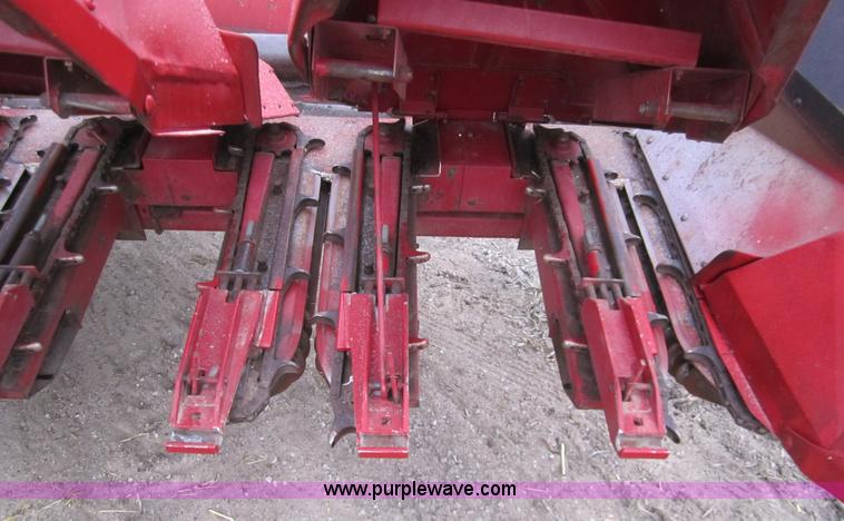image for item 3200 1989 Case 1083 eight row corn head