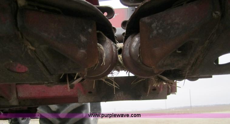 image for item 3200 1989 Case 1083 eight row corn head