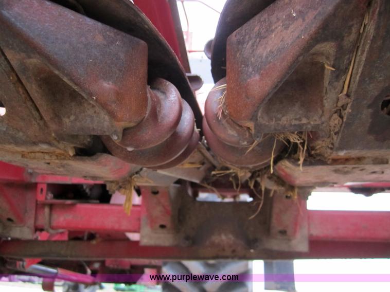 image for item 3200 1989 Case 1083 eight row corn head