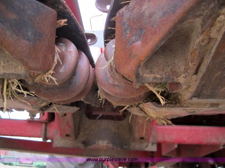 image for item 3200 1989 Case 1083 eight row corn head