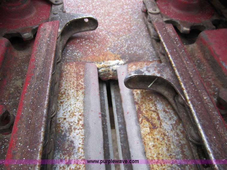 image for item 3200 1989 Case 1083 eight row corn head