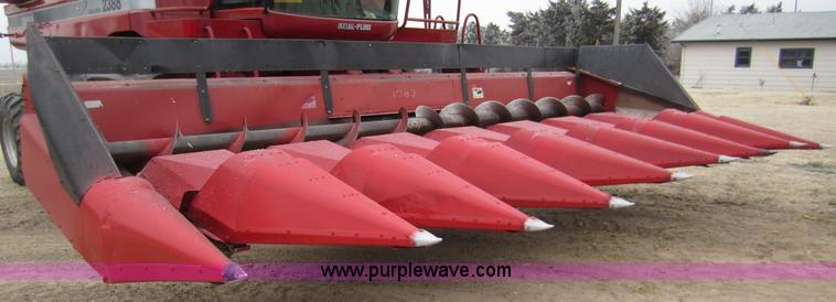 image for item 3200 1989 Case 1083 eight row corn head