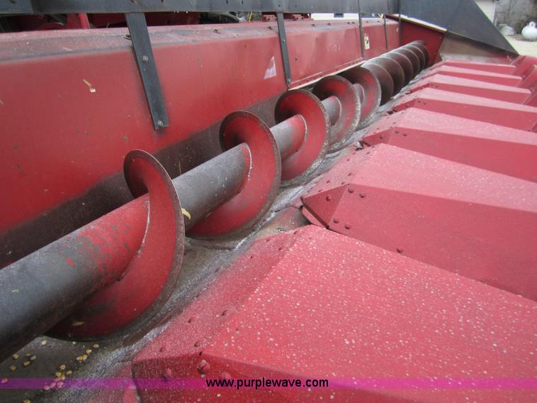 image for item 3200 1989 Case 1083 eight row corn head