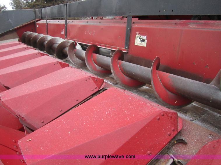 image for item 3200 1989 Case 1083 eight row corn head