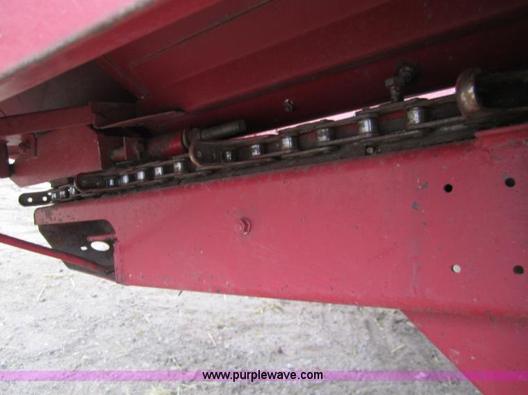 image for item 3200 1989 Case 1083 eight row corn head