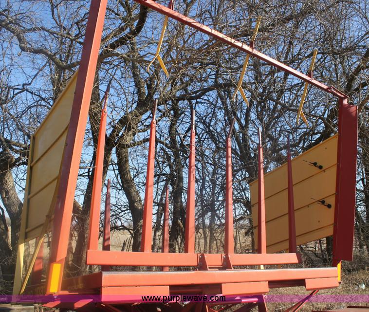 image for item 6345 2000 New Holland 1037 bale accumulator stakliner