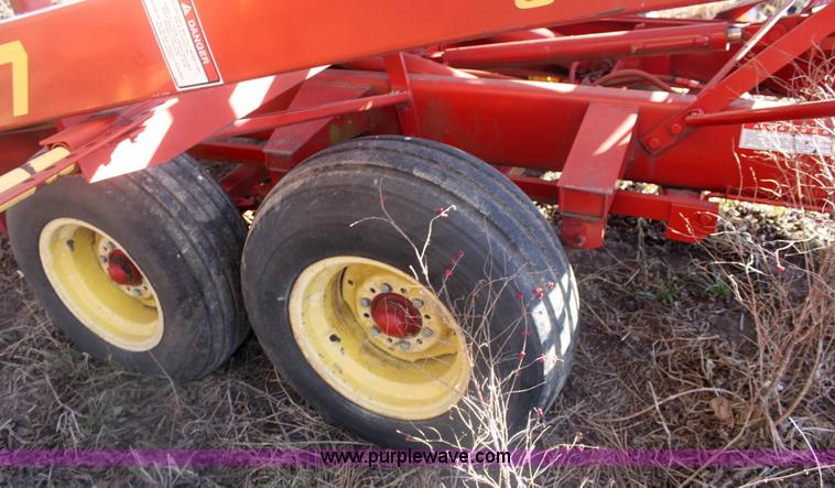 image for item 6345 2000 New Holland 1037 bale accumulator stakliner