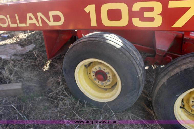 image for item 6345 2000 New Holland 1037 bale accumulator stakliner