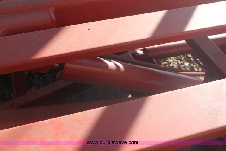 image for item 6345 2000 New Holland 1037 bale accumulator stakliner