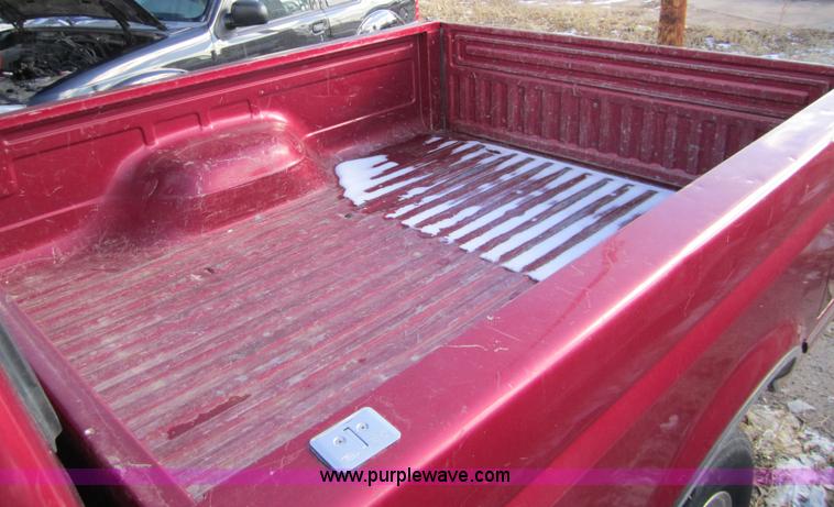 image for item 3311 1995 Ford F150 Eddie Bauer extended cab pickup truck